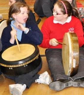 a bodhrán duet at the launch of the peace forest